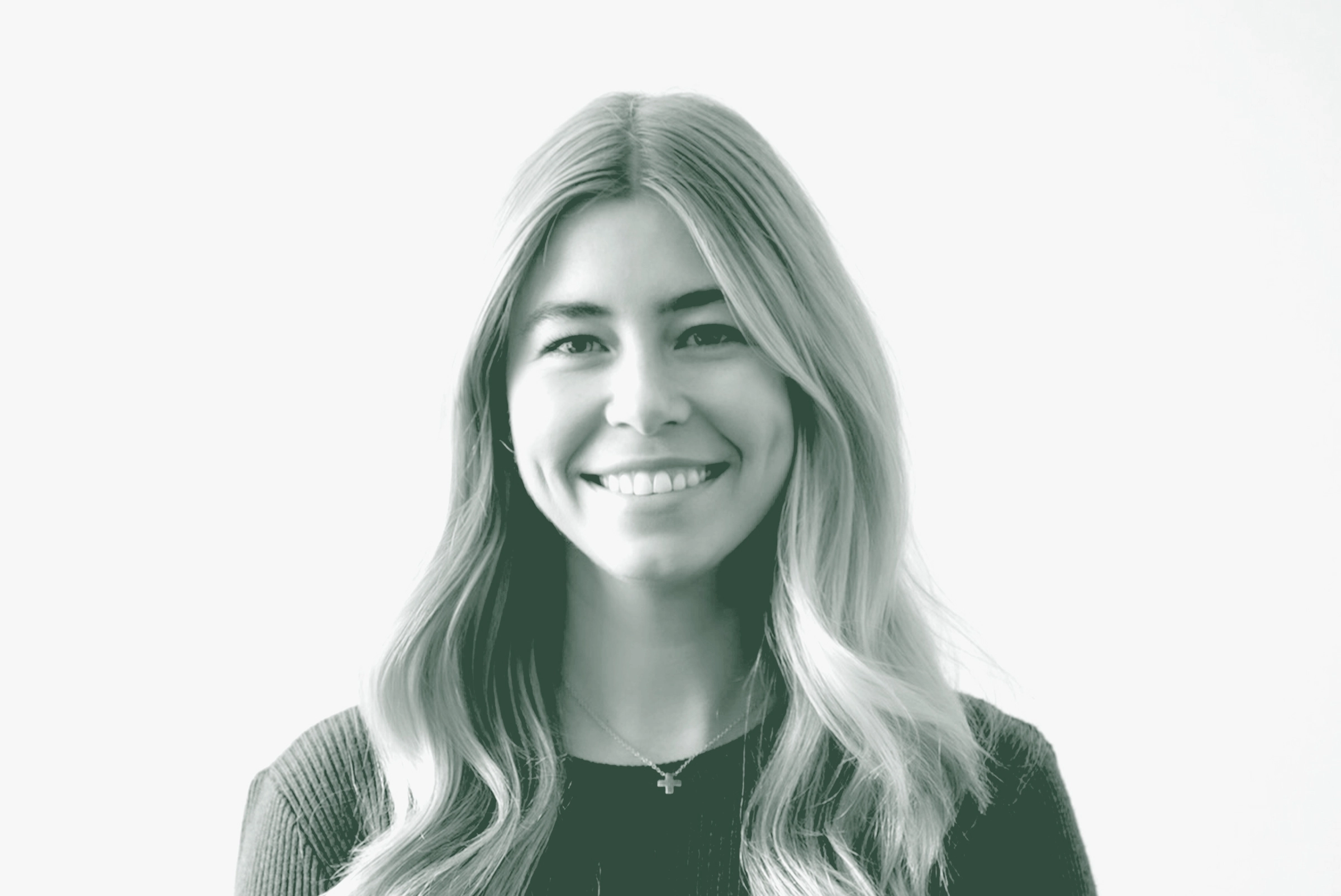 Farris McNabb Portrait A black and white portrait of Farris McNabb, a Marketing Leader with GFF, in front of a white background.