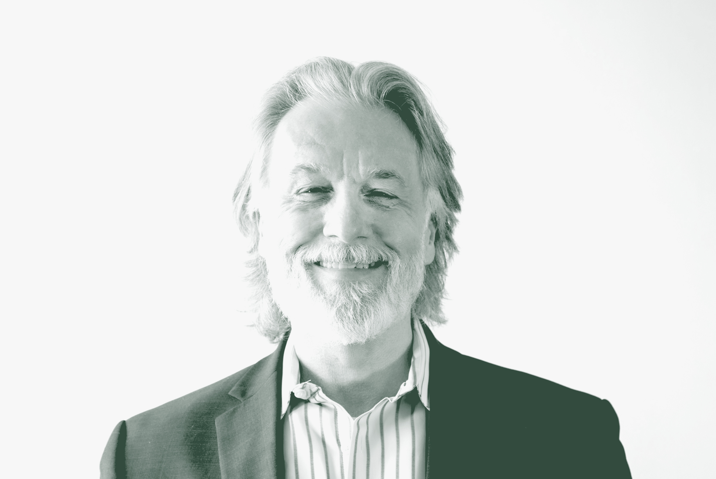 A black and white portrait of Brian Kuper, the Design Principal with GFF, in front of a white background.