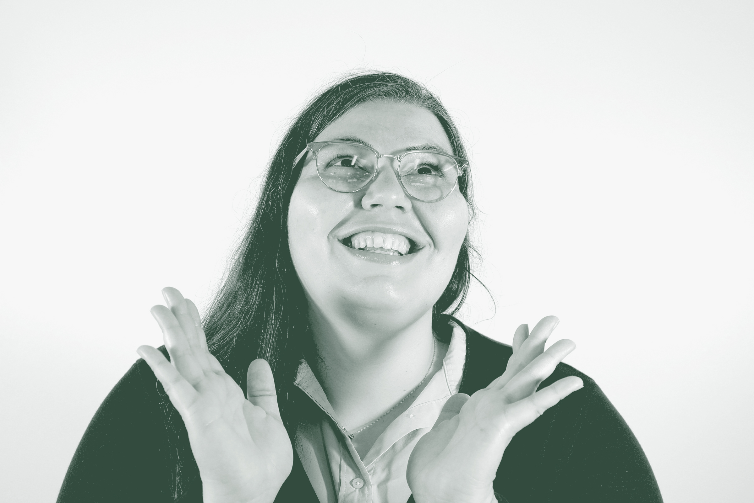 A black and white portrait of Sarah Hamzeh, a Project Leader with GFF in the Fort Worth Studio, in front of a white background.