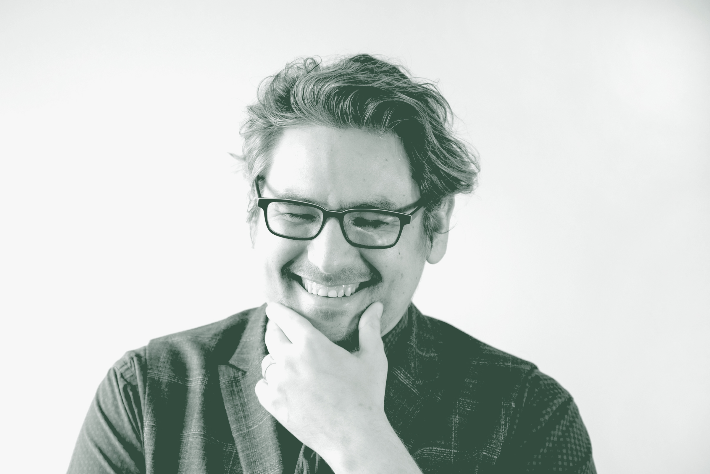 A black and white portrait of Jason Fedors, a Planning Leader with GFF in the Planning Studio, in front of a white background.