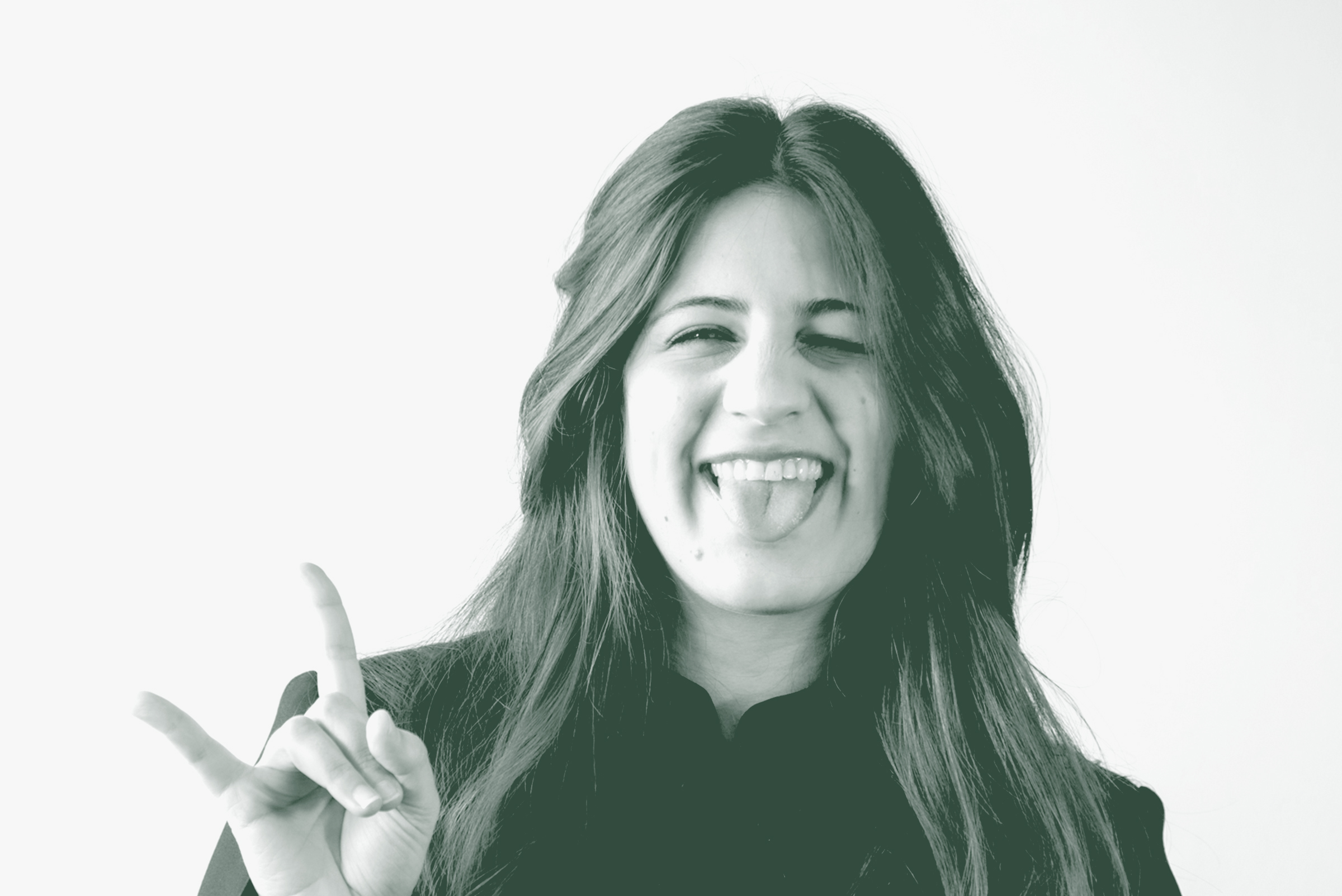 A black and white portrait of Deniz Soydan, a Project Coordinator with GFF in the Mixed-Use & Multifamily Studio, in front of a white background.