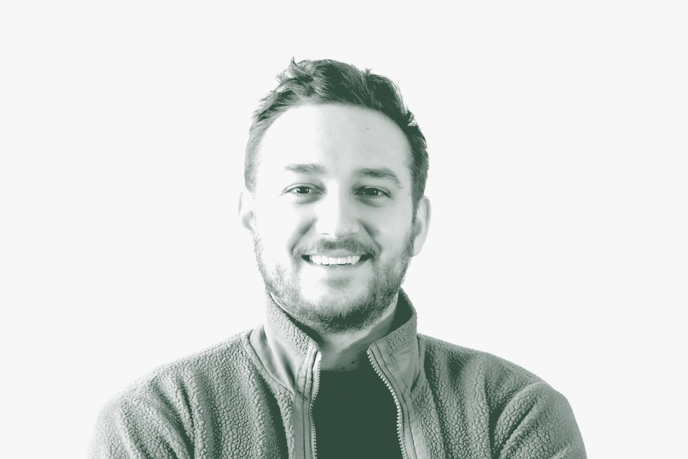 A black and white portrait of Ben Wade, a Landscape Architecture Coordinator with GFF in the Landscape Architecture Studio, in front of a white background.