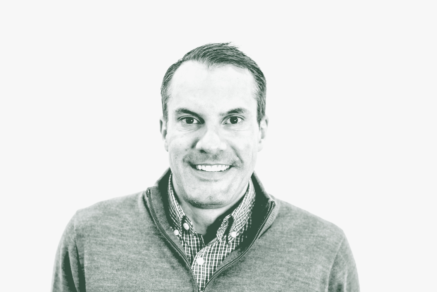 A black and white portrait of Bart Wilburn, a Senior HR Leader with GFF, in front of a white background.