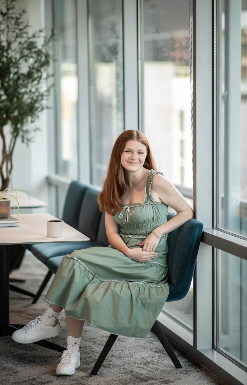 Mary Grace Eccleston, Operations Professional at GFF, photographed in a bright modern Dallas office interior at a leading design firm.
