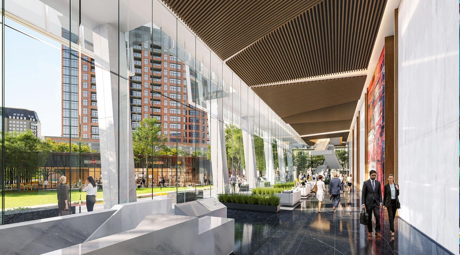 Interior view of the 23Springs lobby with floor-to-ceiling glass, natural stone finishes, art installation, and views to the outdoor plaza.