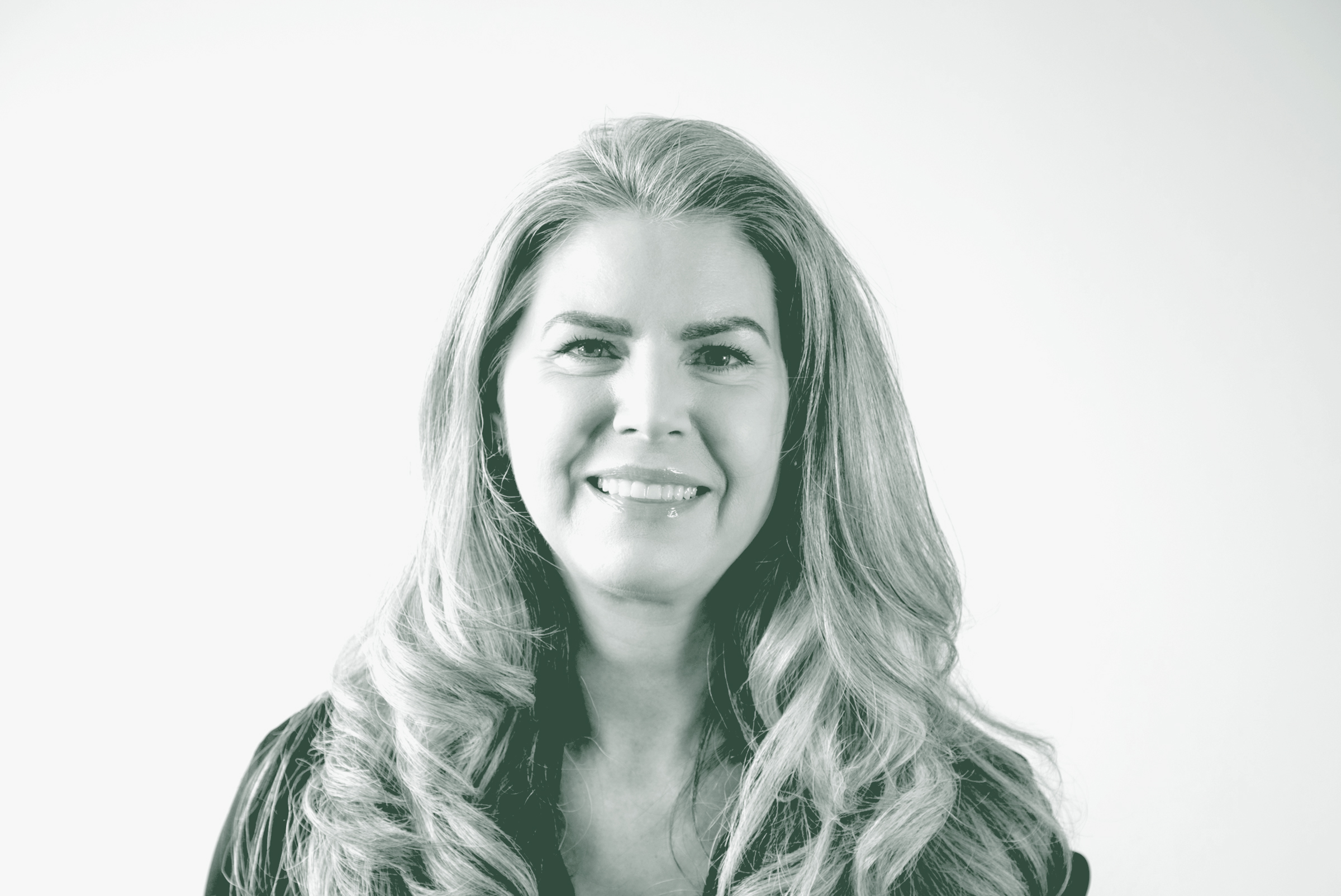 Danielle Davis Portrait A black and white portrait of Danielle Davis, an Associate and the Director of Accounting with GFF, in front of a white background.