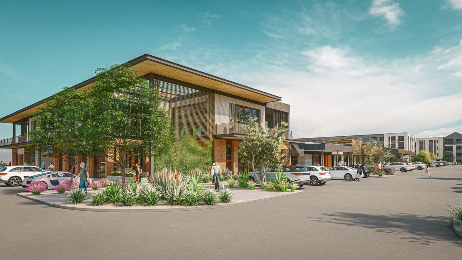 Modern mixed-use building with landscaped parking area and people walking.