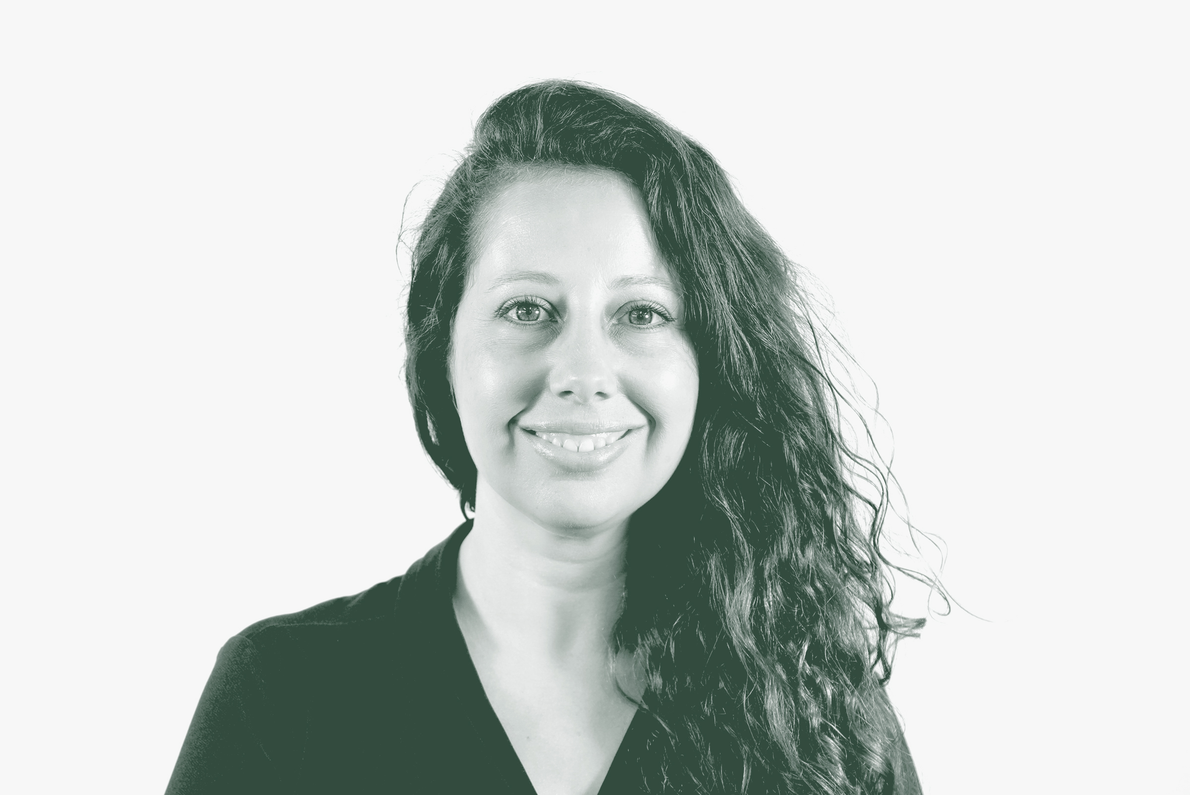 A black and white portrait of Jamie Wallace, an Associate and Design Leader with GFF in the Fort Worth Studio, in front of a white background.