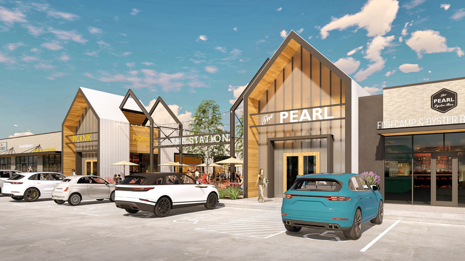 Parking lot entrance to The Station - Sachse during the day