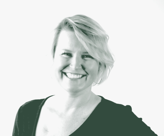 A black and white portrait of Taylor Catalano, an Associate and an HR Leader with GFF, in front of a white background.