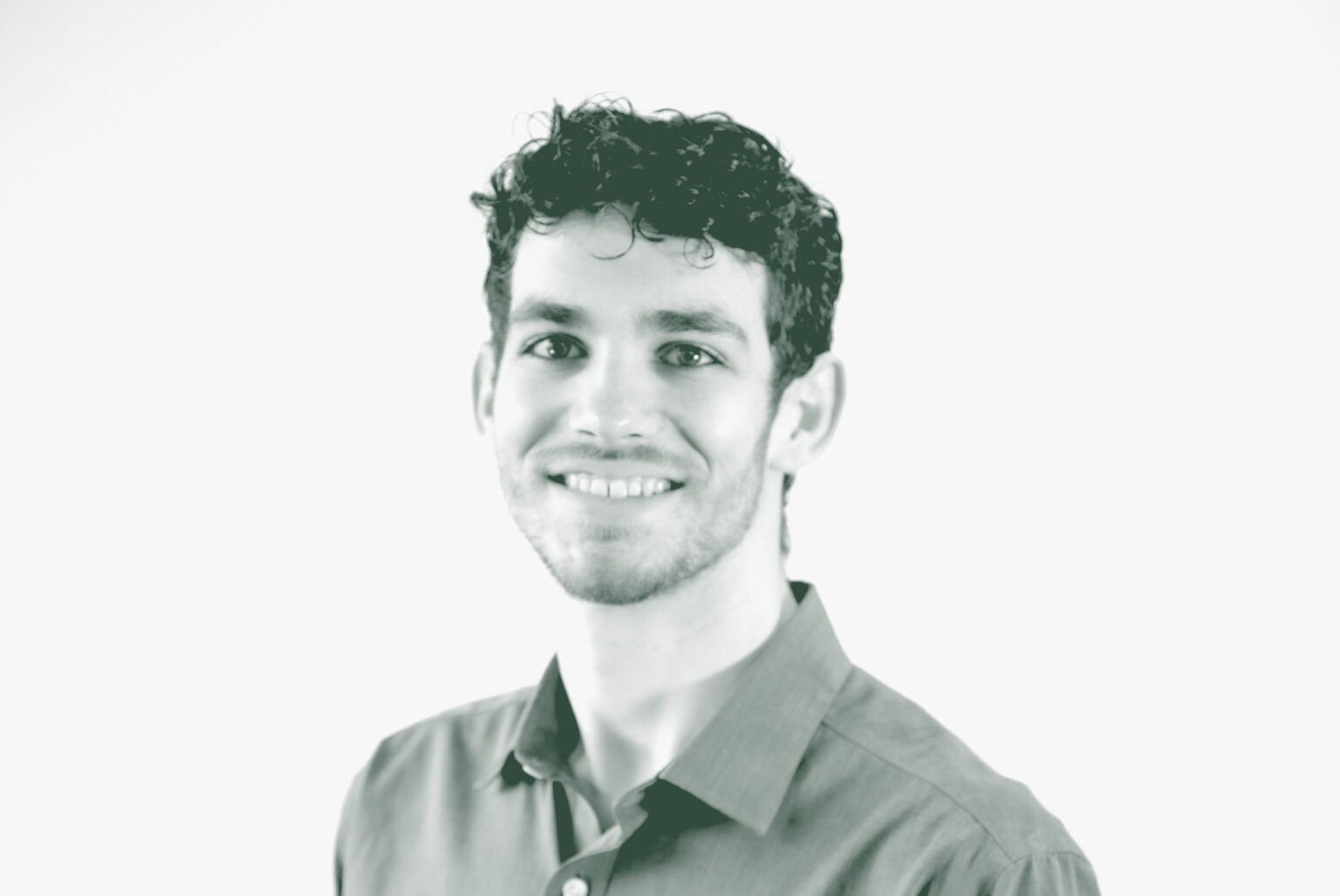 A black and white portrait of Jonathan Moebius, an Architectural Professional with GFF in the Planning Studio, in front of a white background.