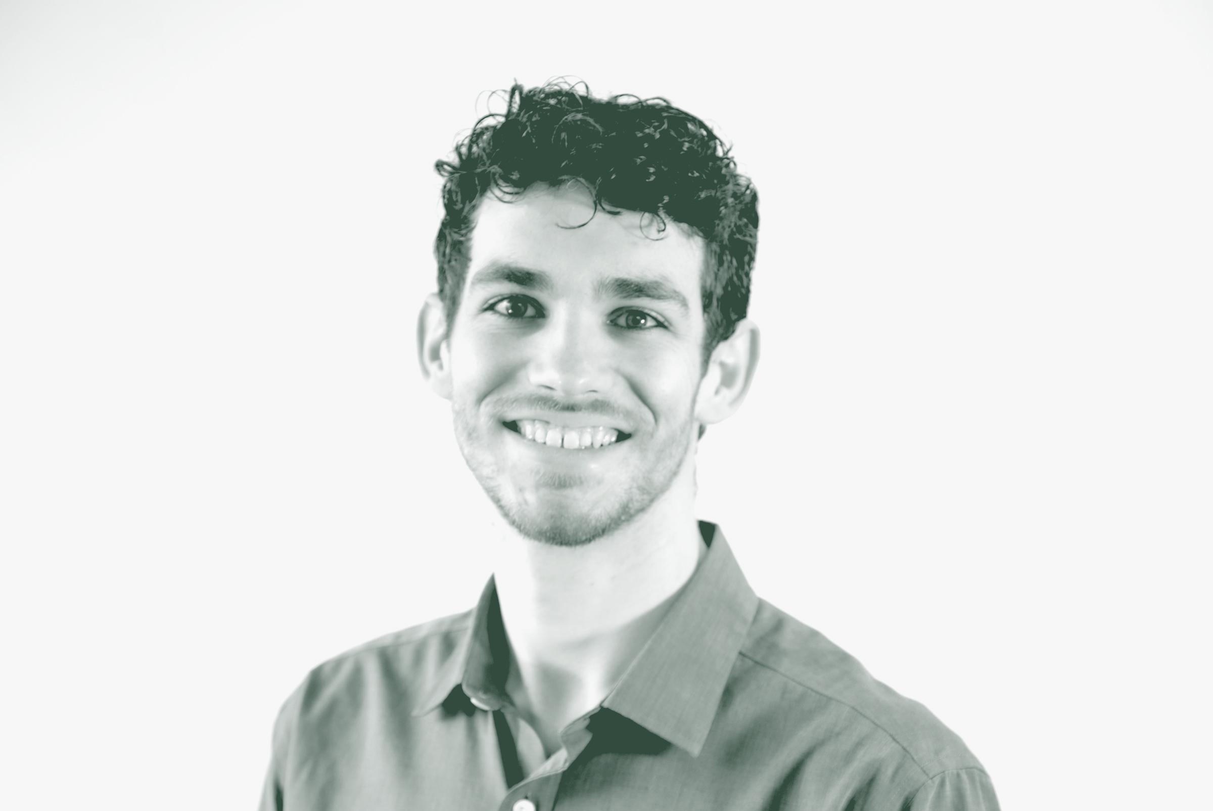 Jonathan Moebius Portrait A black and white portrait of Jonathan Moebius, an Architectural Professional with GFF in the Planning Studio, in front of a white background.