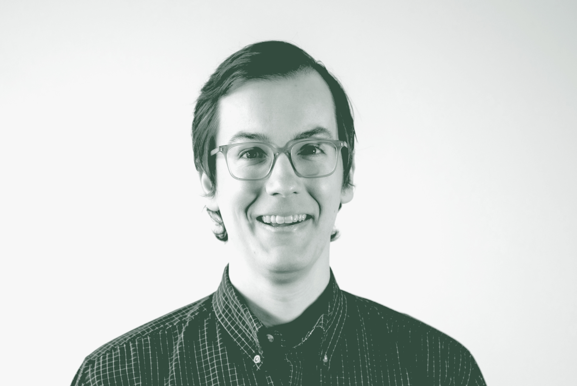 Matt Frame Portrait A black and white portrait of Matt Frame, a Project Leader with GFF in the Mixed-Use & Multifamily Studio, in front of a white background.