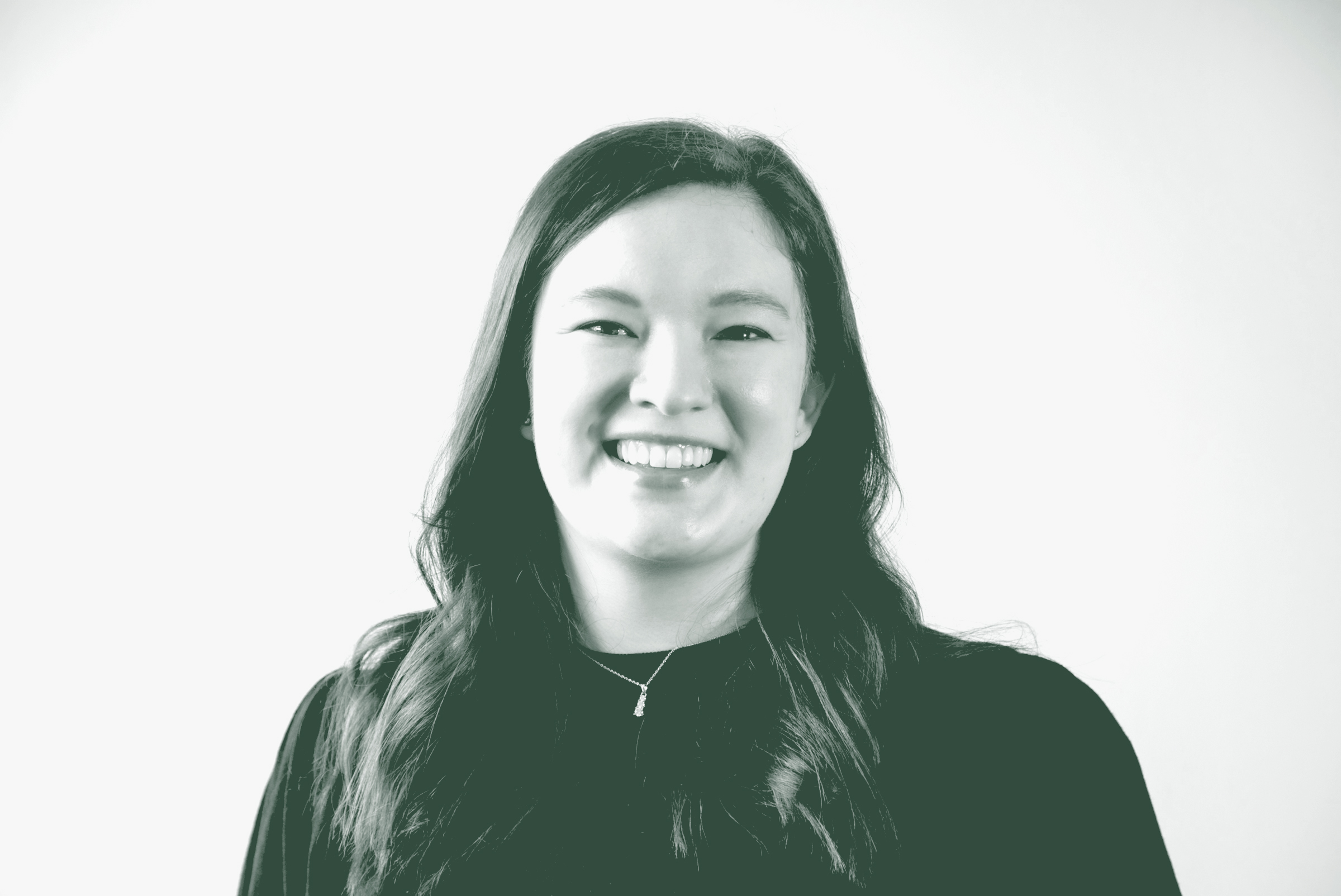 Sarah Wheeler Portrait A black and white portrait of Sarah Wheeler, a Senior Project Coordinator with GFF in the Education Studio, in front of a white background.