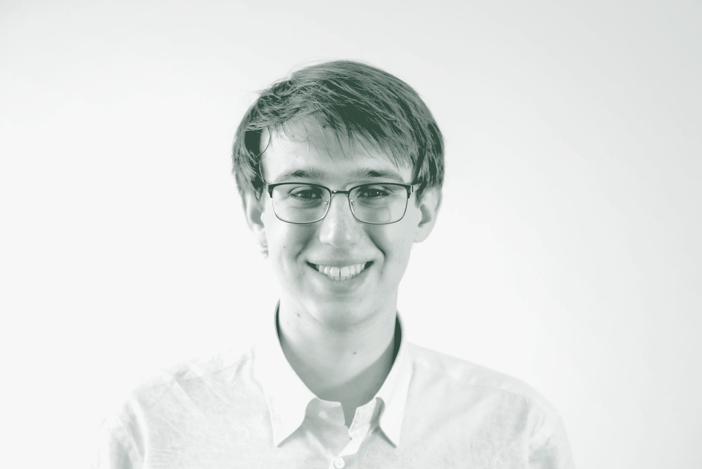 Scott MacKenzie Portrait A black and white portrait of Scott MacKenzie, an IT Coordinator with GFF, in front of a white background.