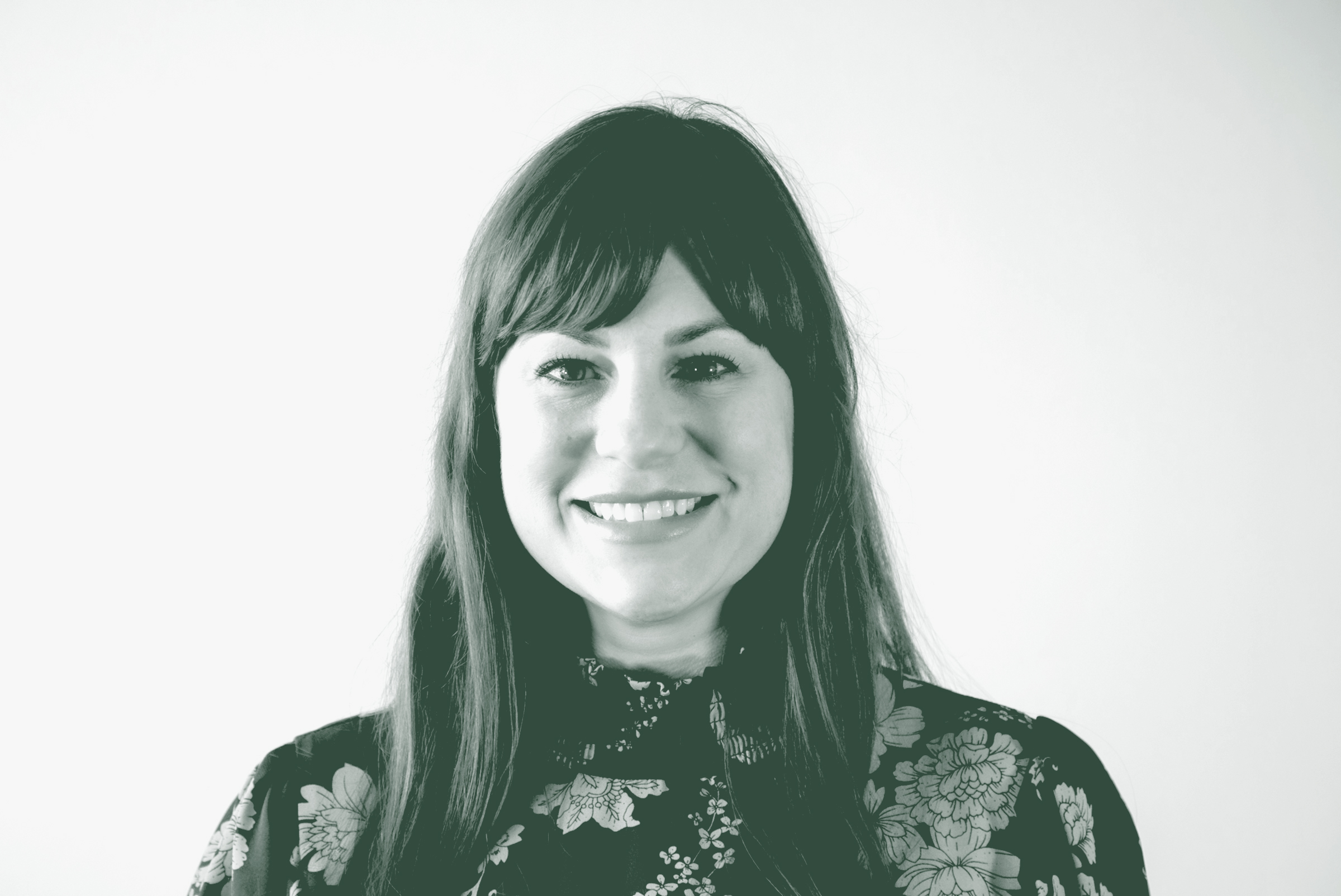 A black and white portrait of Shannon Fahey, a Senior Office Manager and Accounting Coordinator with GFF, in front of a white background.