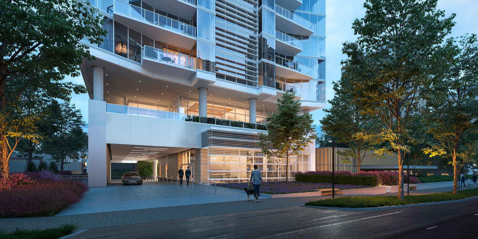 Street-level view of the luxury residential tower’s entrance, showcasing modern design elements, glass façades, and landscaped surroundings.