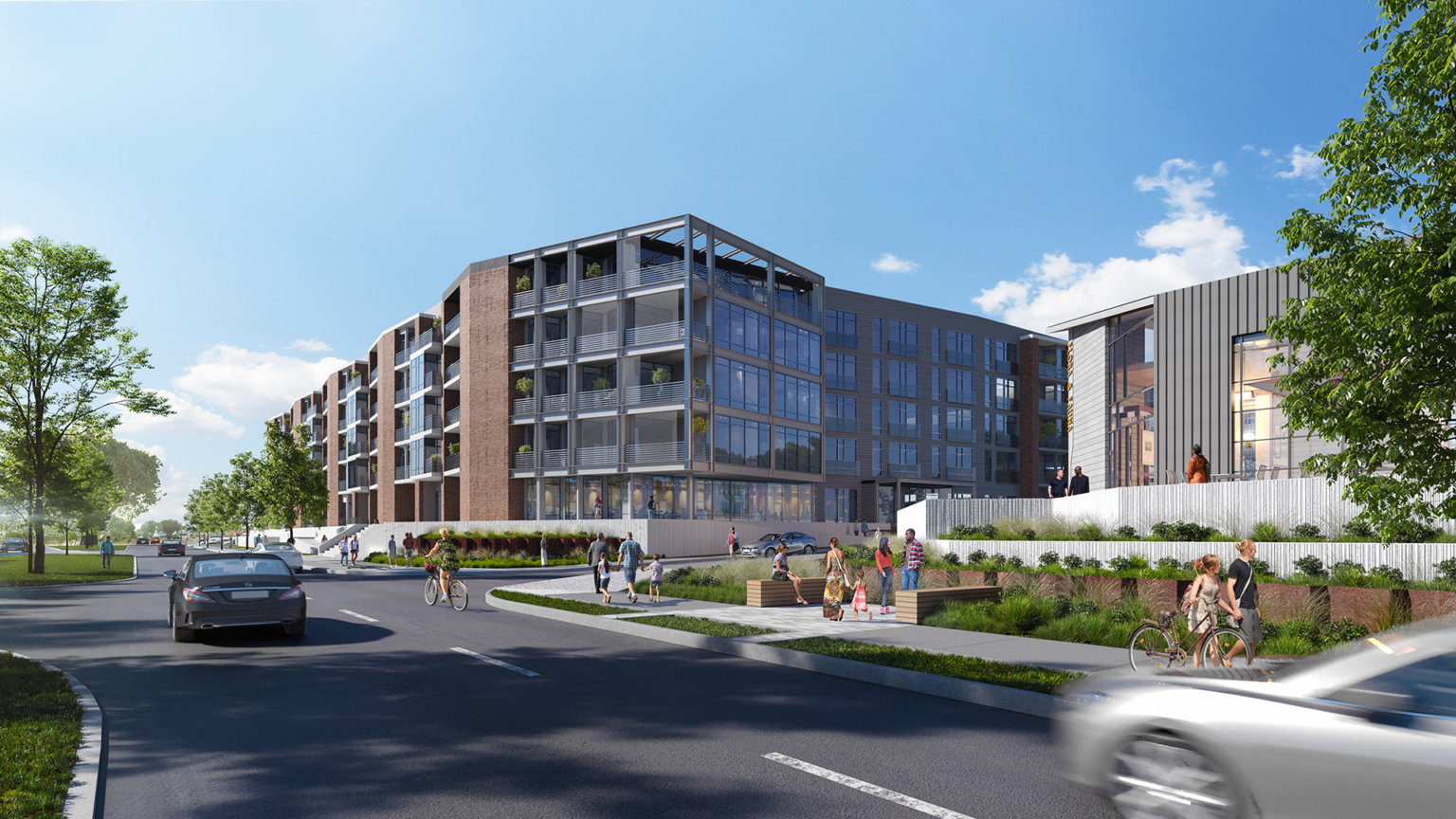 Perspective view of the Barvin Braeswood residential building, showing its brick façade and outdoor terraces.