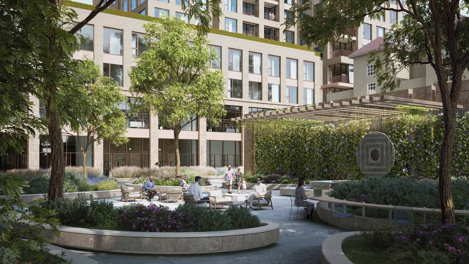 Courtyard with lush landscaping, seating areas, and a pergola at Knox Promenade.