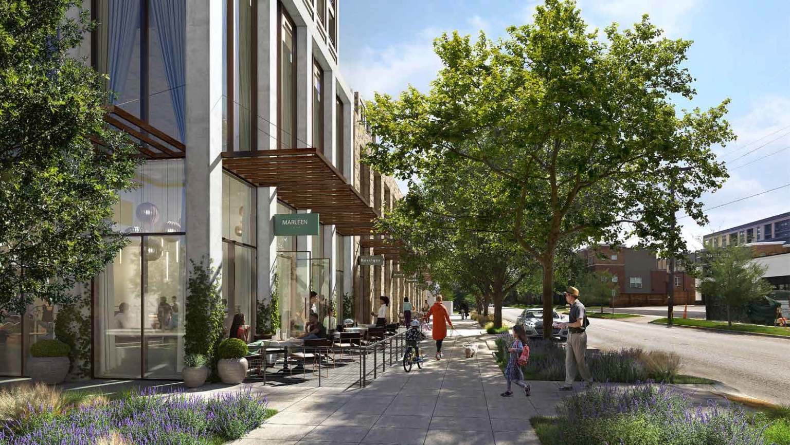 Streetscape view at Knox Promenade with outdoor dining, tree-lined sidewalks, and pedestrian activity.