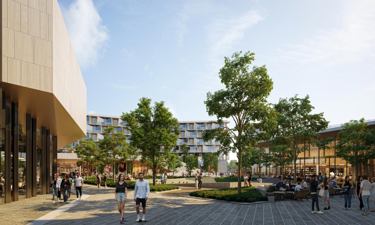 Pedestrian view of the Center for the Arts courtyard framed by the theater and studio buildings, emphasizing integrated landscape design and outdoor gathering areas.