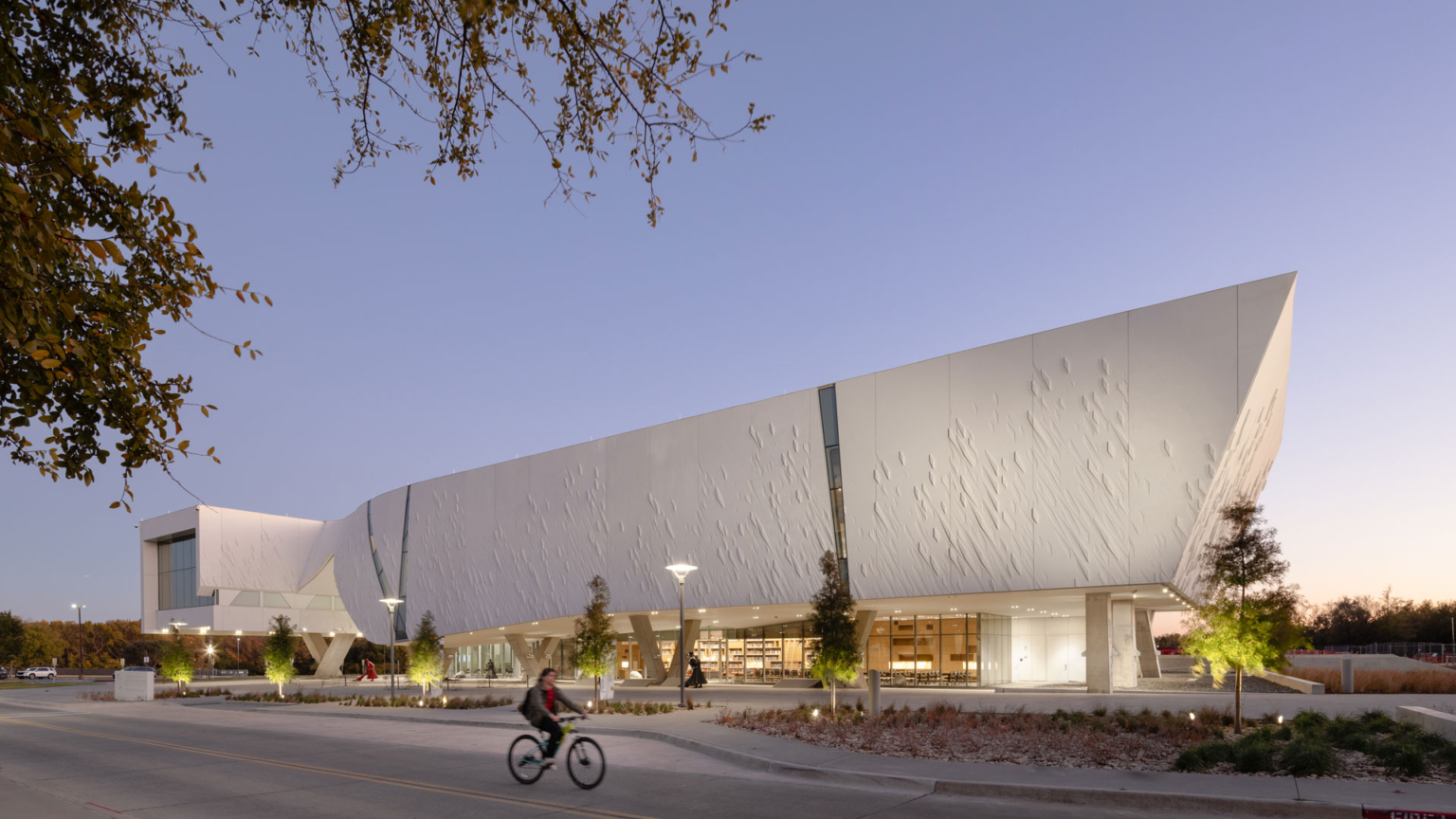 Street-facing façade of UT Dallas Athenaeum Phase 1, a contemporary museum and arts center.