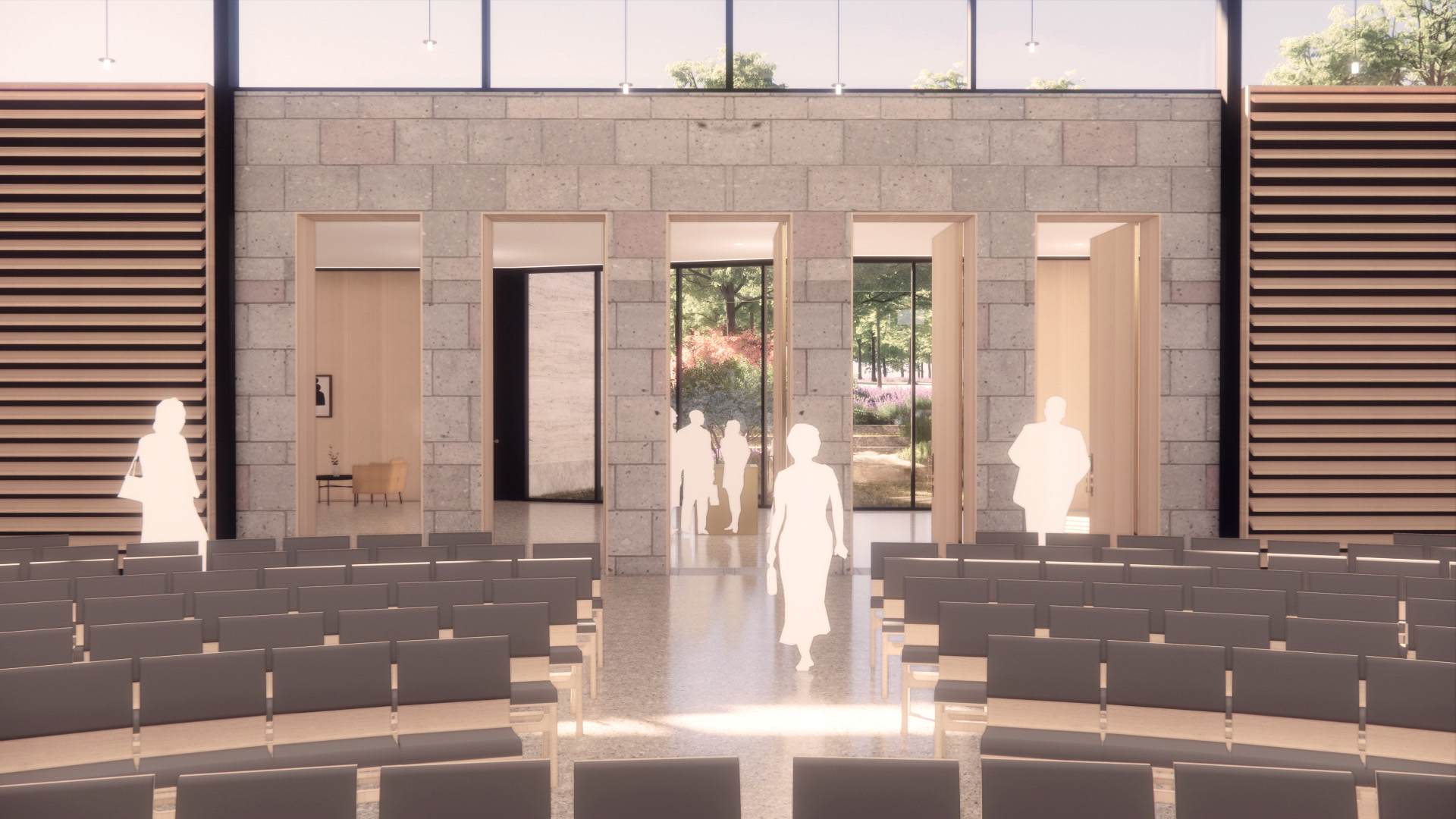 Aisle of the Concordia University Chapel with seating and light streaming through the glass wall.