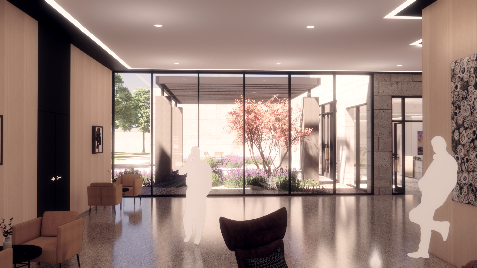 Interior hallway of the Concordia University Chapel with seating and glass walls facing an inner garden.