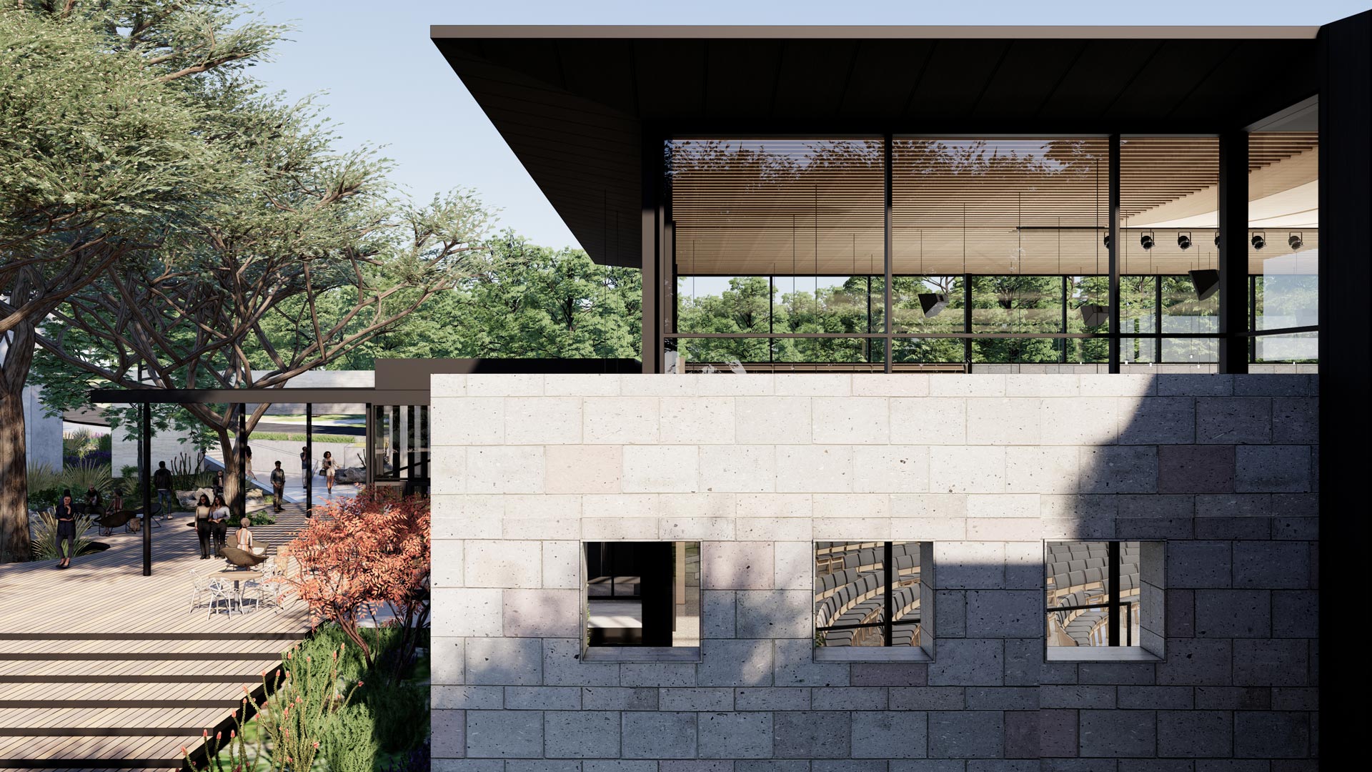 View of Concordia University Chapel showing preserved garden wall, Spanish live oak trees, and glass chapel volume above.