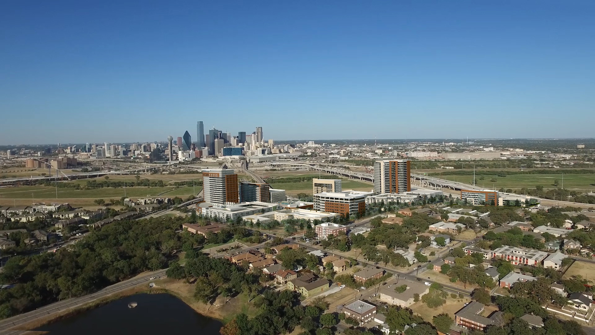 Expanded aerial view of the Oak Farms Master Plan, showcasing the mixed-use layout with proximity to downtown Dallas and the Trinity River.