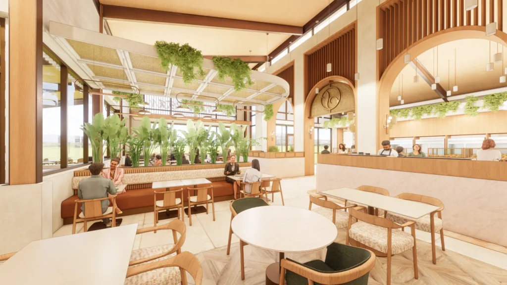 A spacious dining area at San Martin Bakery in Plano, Texas, featuring wood furnishings, lush greenery, woven pendant lighting, and large arched openings.