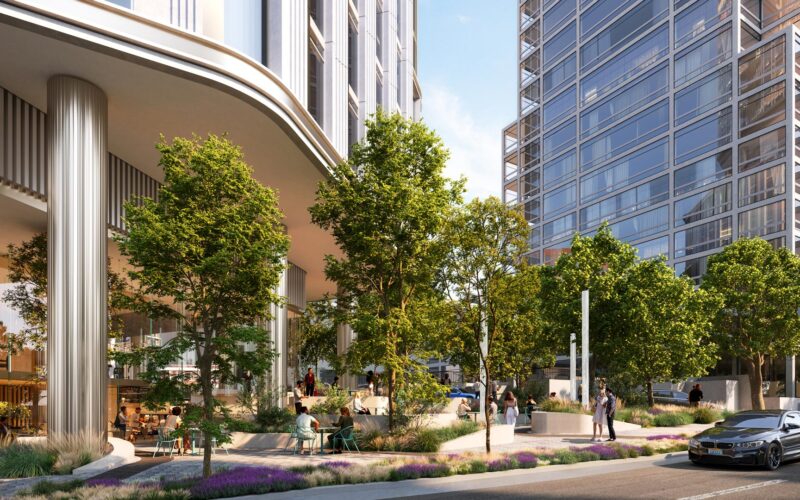 Close-up rendering of the plaza and building base at 1899 McKinney Avenue, with café seating, trees, and retail frontage in Dallas high-rise zone.