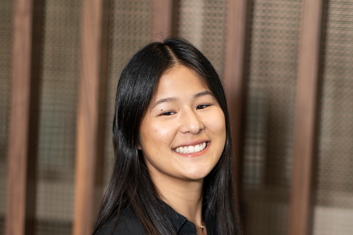Kaitlin Salanski, Architectural Professional in GFF’s Dallas office, close-up professional portrait in a modern workplace setting.