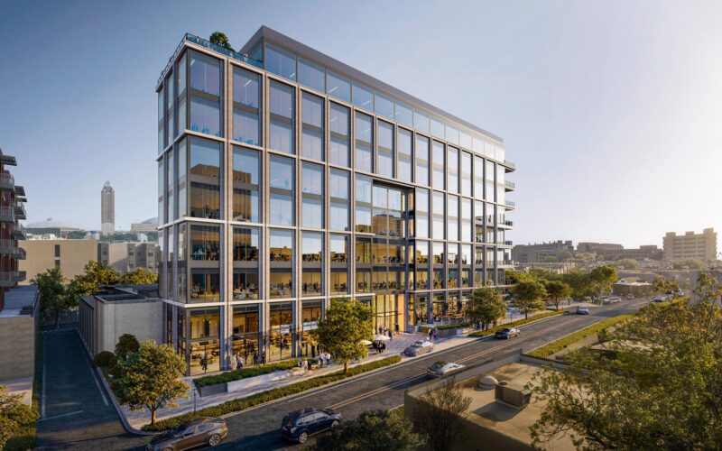Exterior view of Crescent Offices West showing glass and stone facade along West Seventh Street in Fort Worth’s Cultural District.