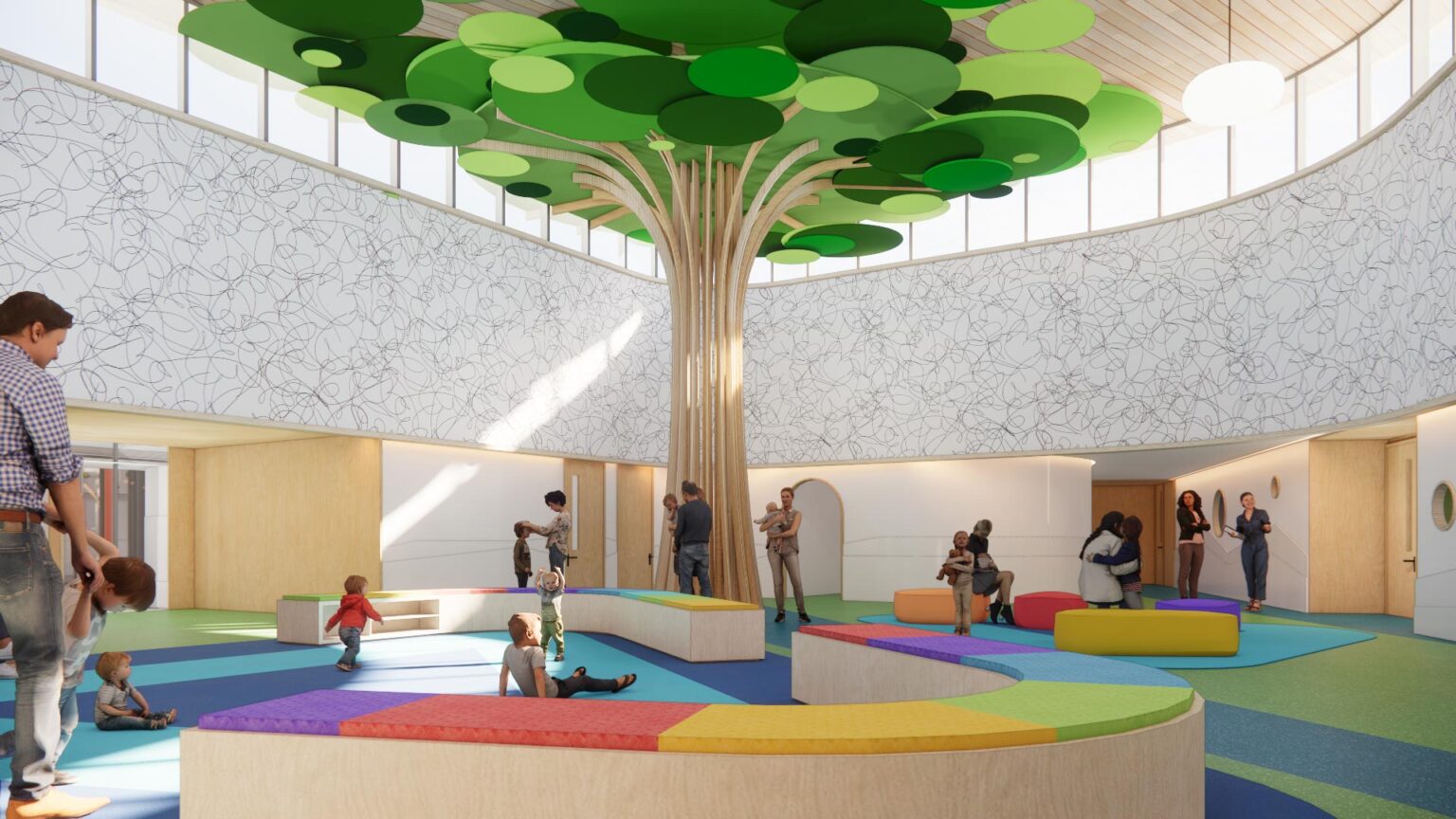 Colorful seating surrounding a sculptural tree in a skylit commons space