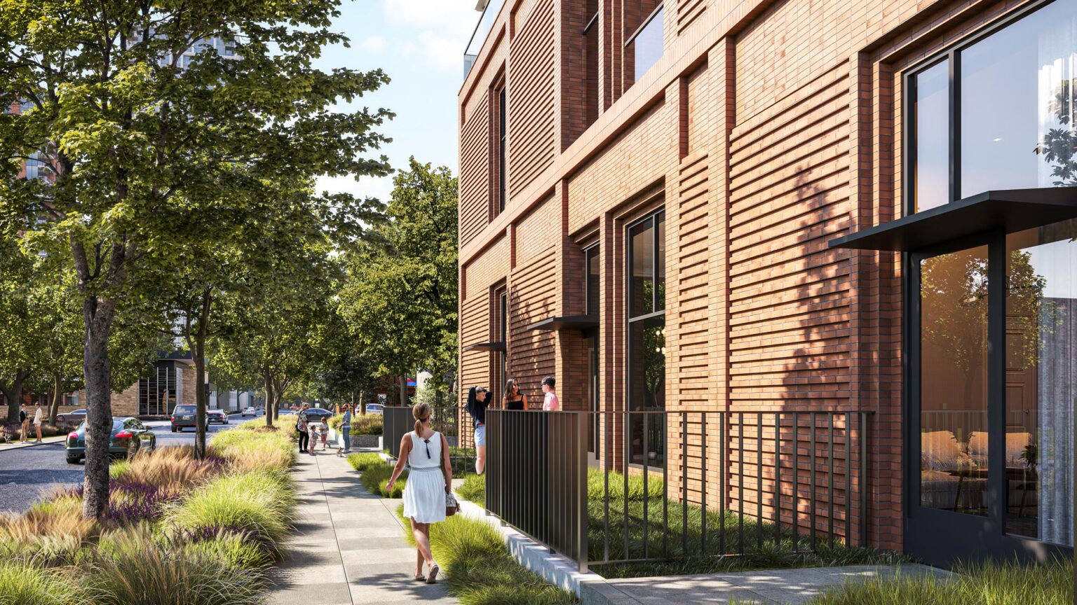 Sidewalk view with landscaped buffers, pedestrians, and red brick base of the mixed-use tower.