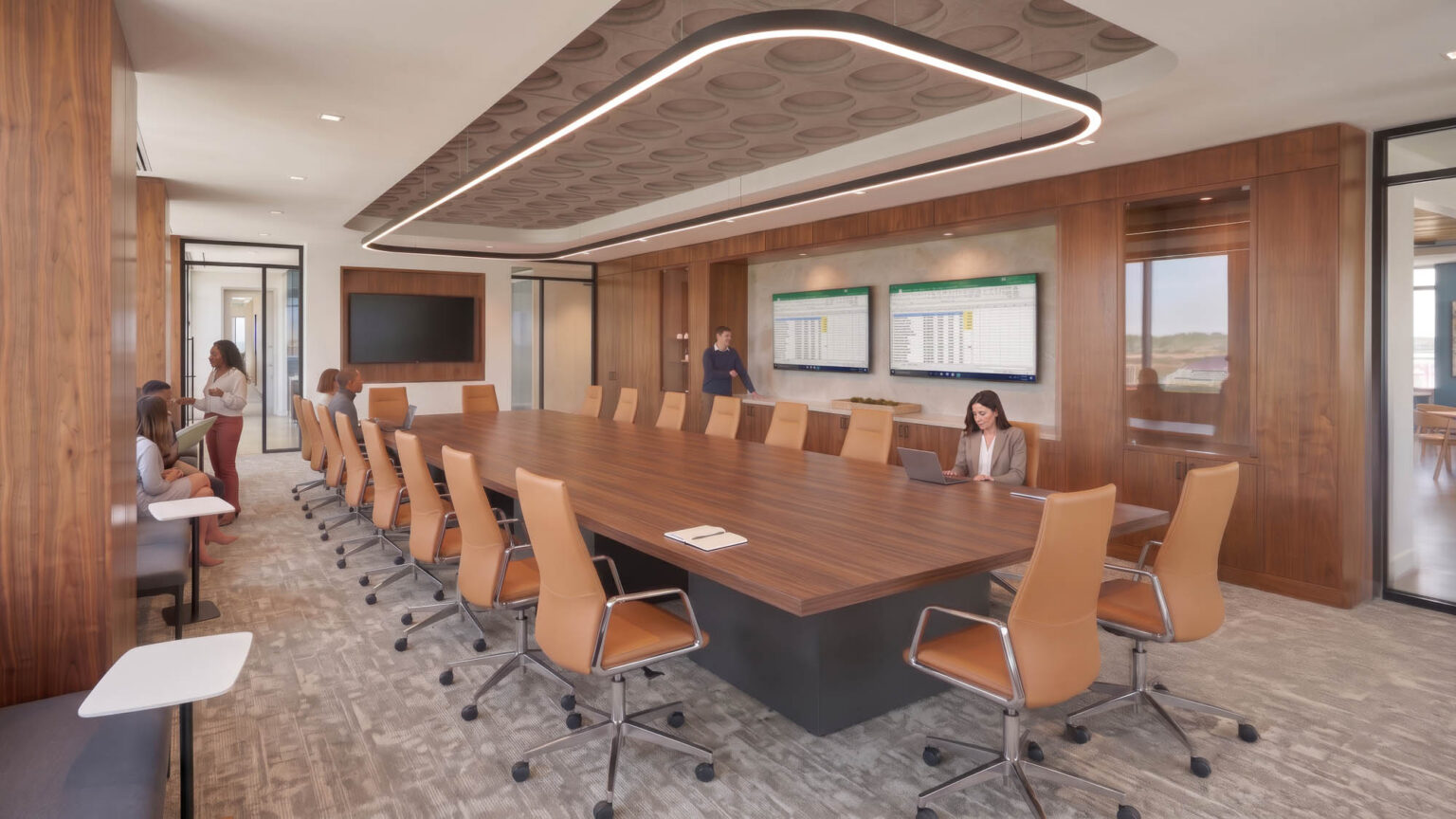 Boardroom at the State Fair of Texas Administration Building in Fair Park with wood paneling, large conference table, integrated displays, and custom lighting.