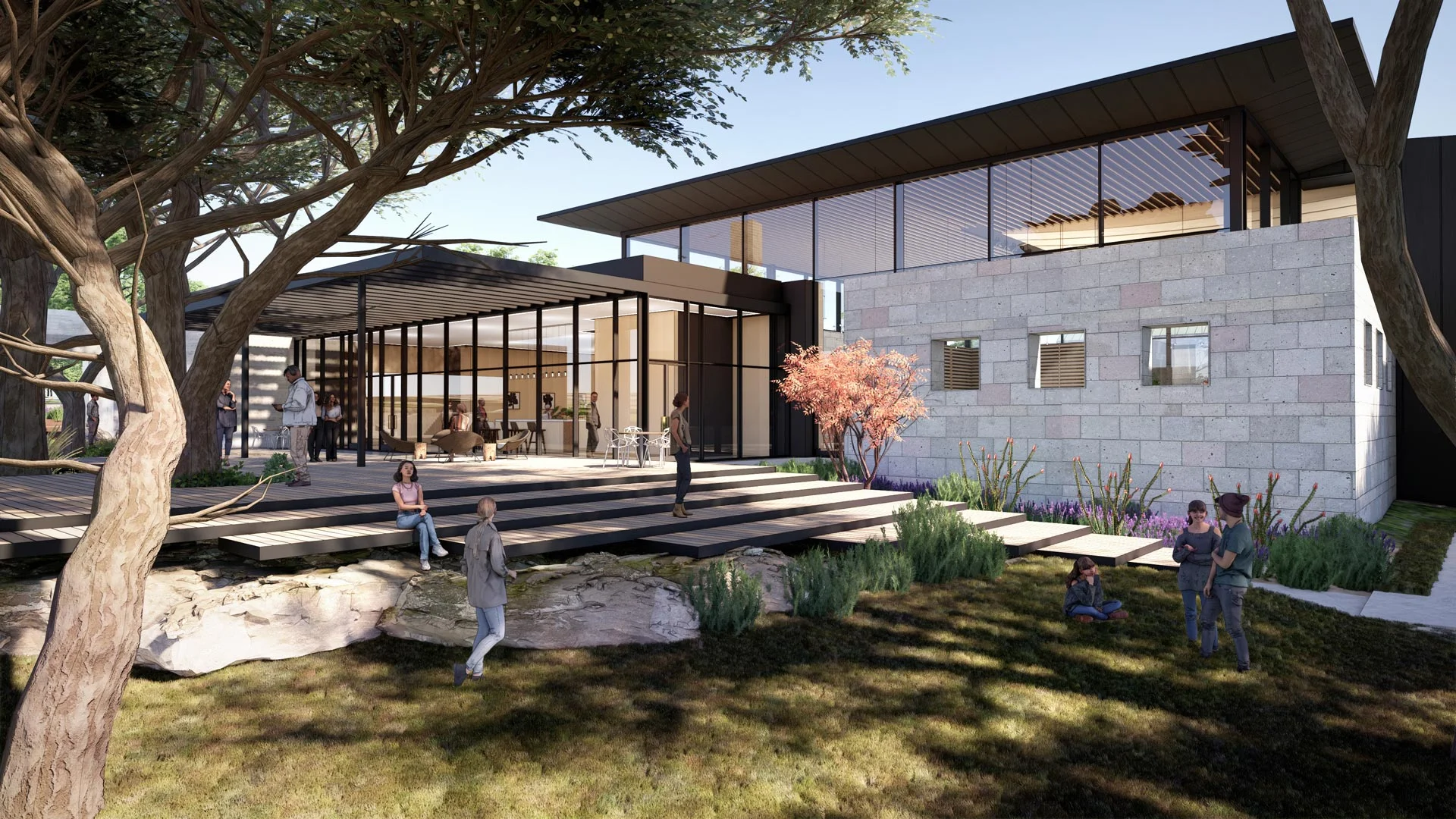 Chapel courtyard view with floating wood deck, preserved stone wall, and large overhangs shading glass volume.
